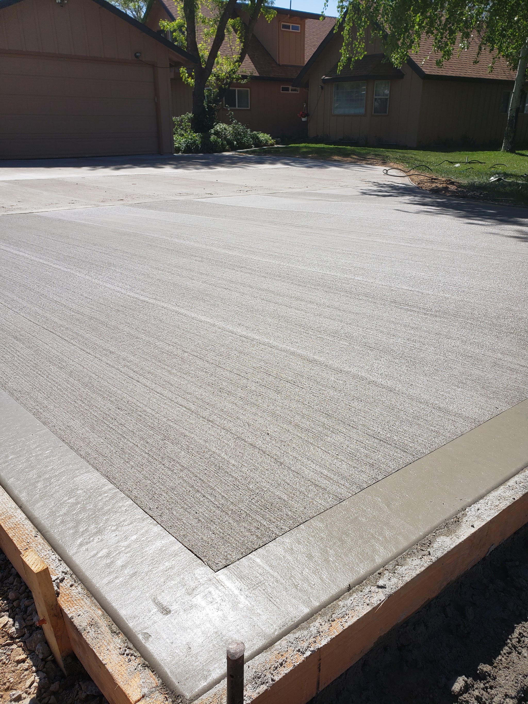 Freshly poured driveway by Williams Custom Concrete